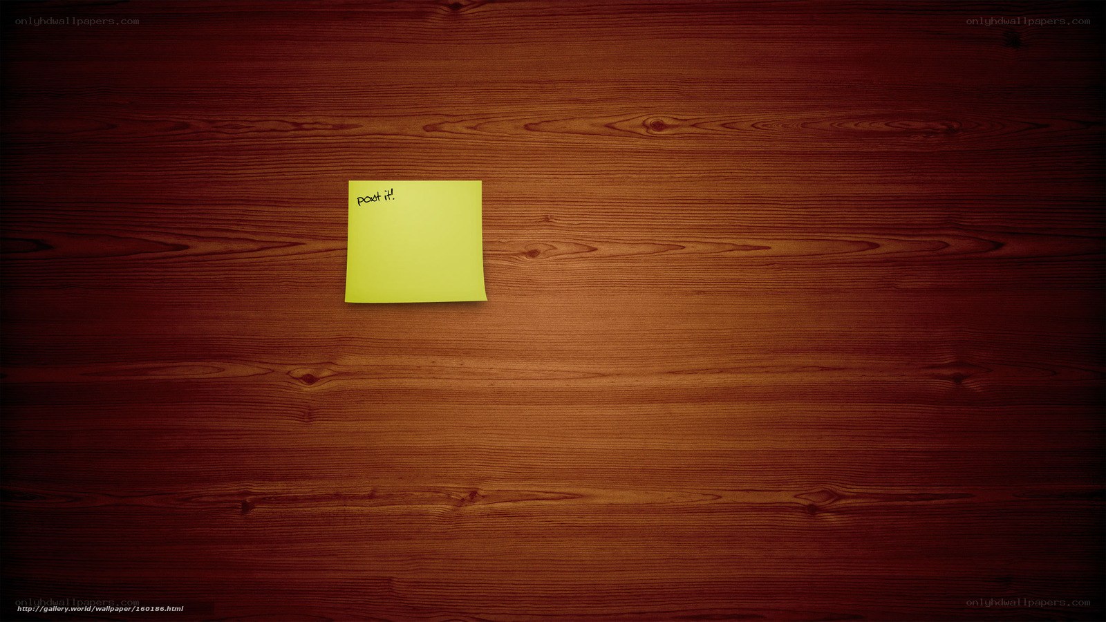 yellow sticky note on wood