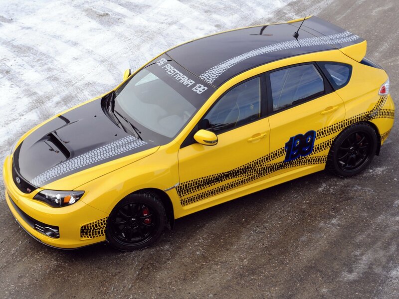 yellow subaru hatchback car