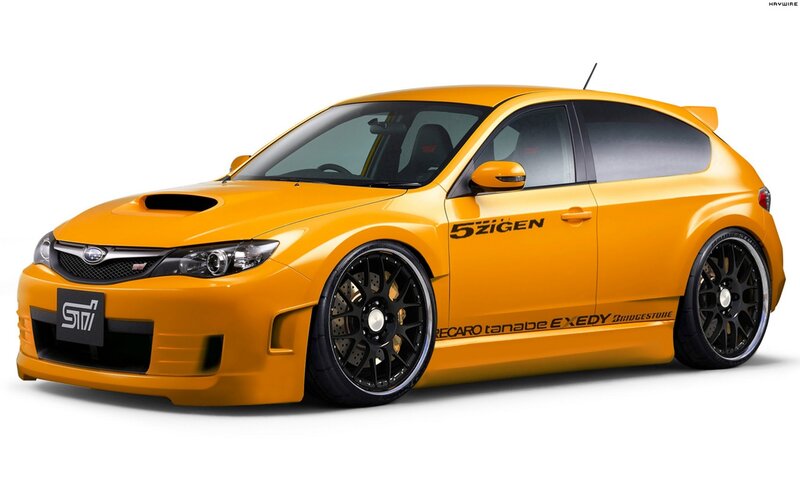 yellow subaru sti hatchback