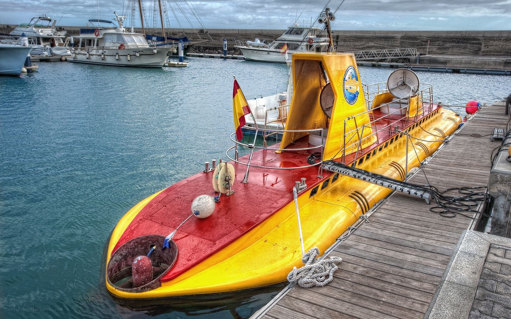 Yellow submarine at harbor dock