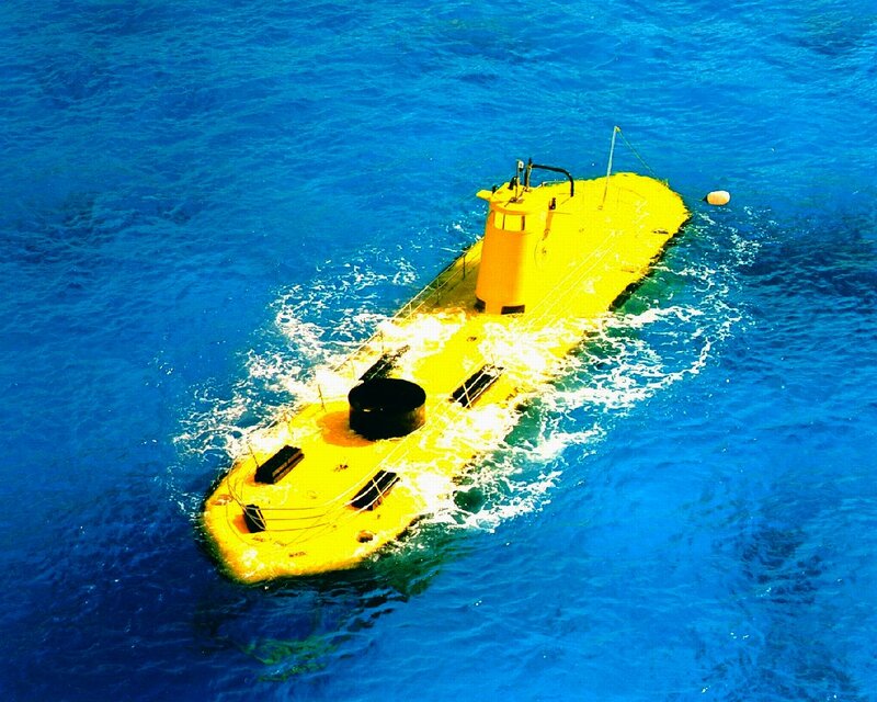 Yellow submarine in blue water