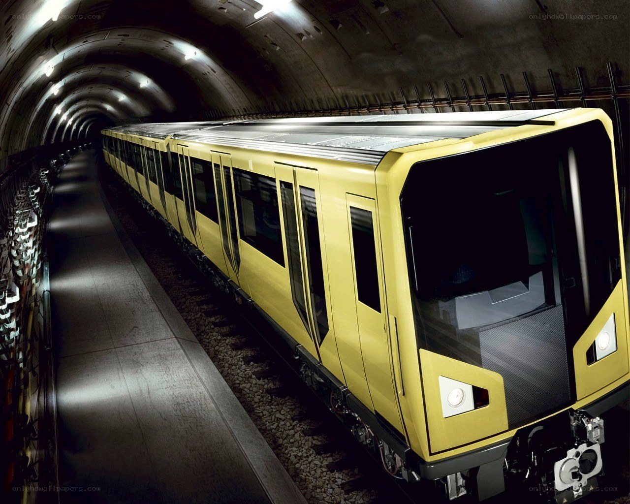 Yellow subway train in tunnel