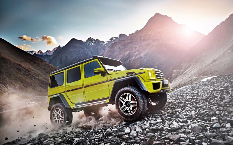 Yellow SUV on Rocky Terrain