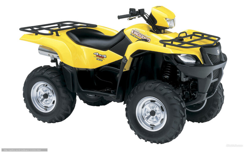 Yellow Suzuki KingQuad ATV