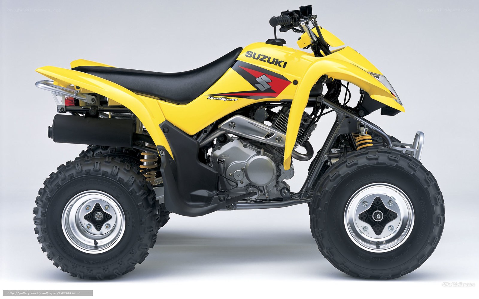 Yellow Suzuki QuadSport ATV