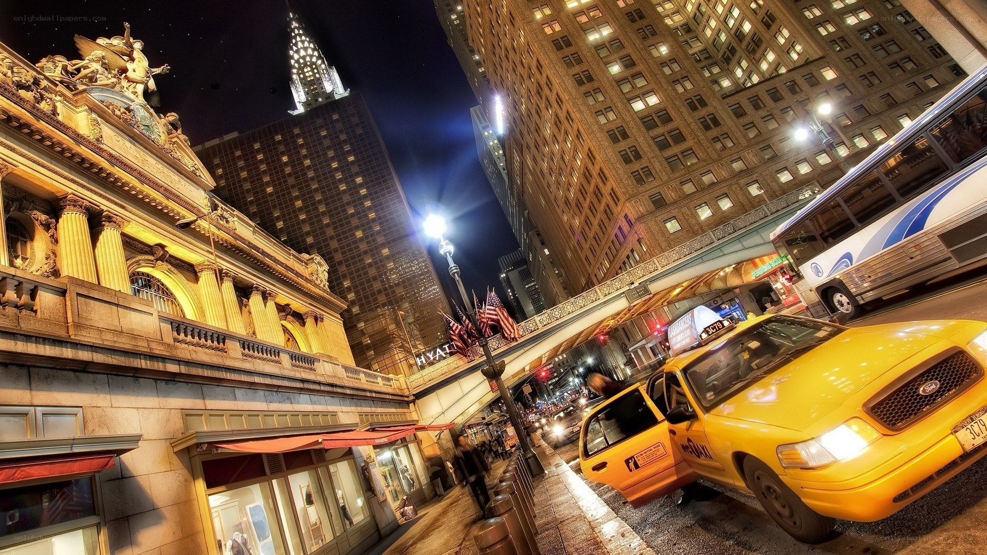 Yellow taxi at Grand Central at night