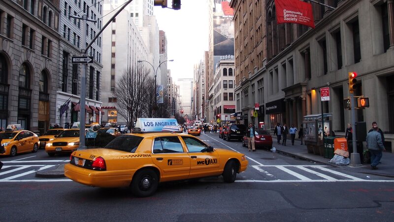 Yellow Taxi Cab — Busy, Afternoon, Photograph, Pedestrians, Buildings, Traffic Lights, Gray