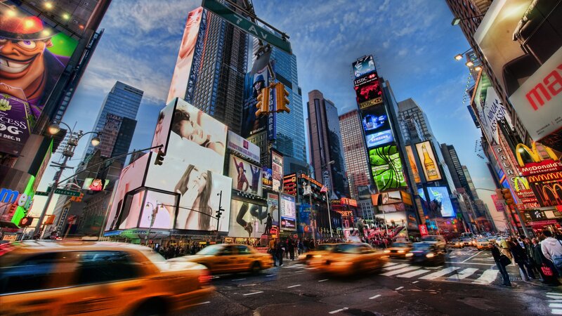 Yellow Taxi Cabs in Traffic