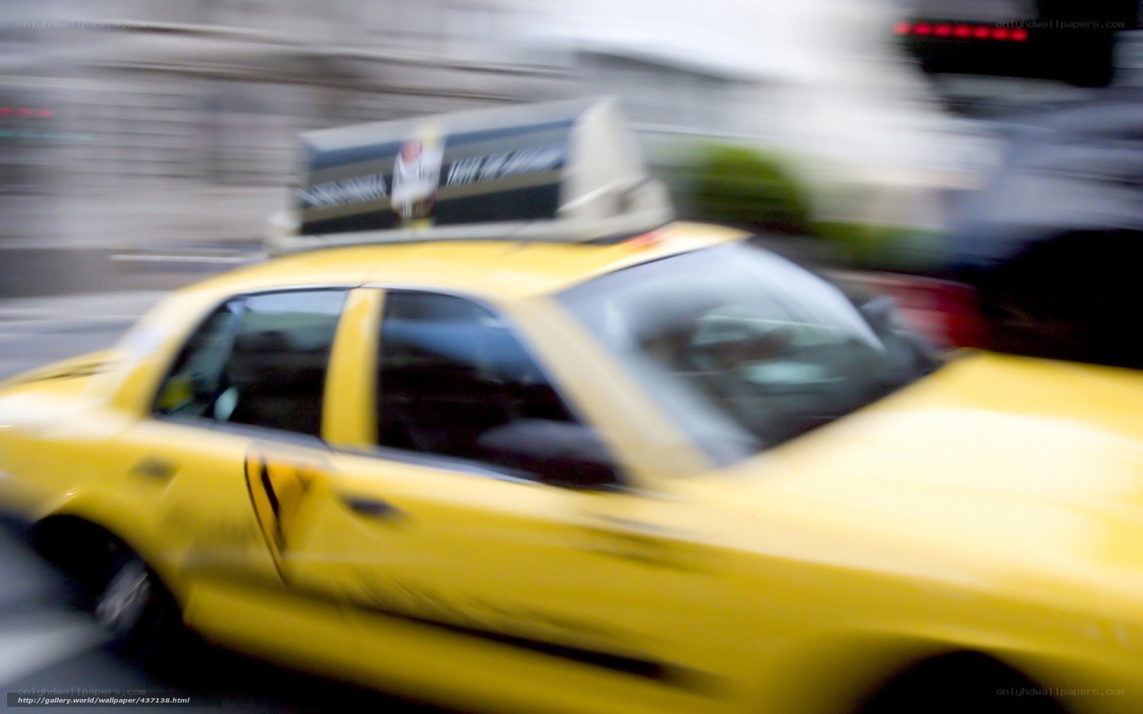 yellow taxi in motion