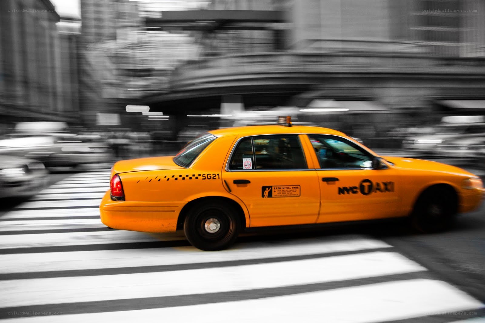 Yellow taxi in motion