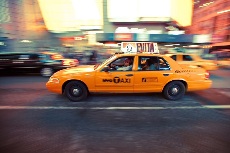 Yellow taxi in motion