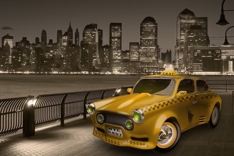 Yellow taxi in NYC at night