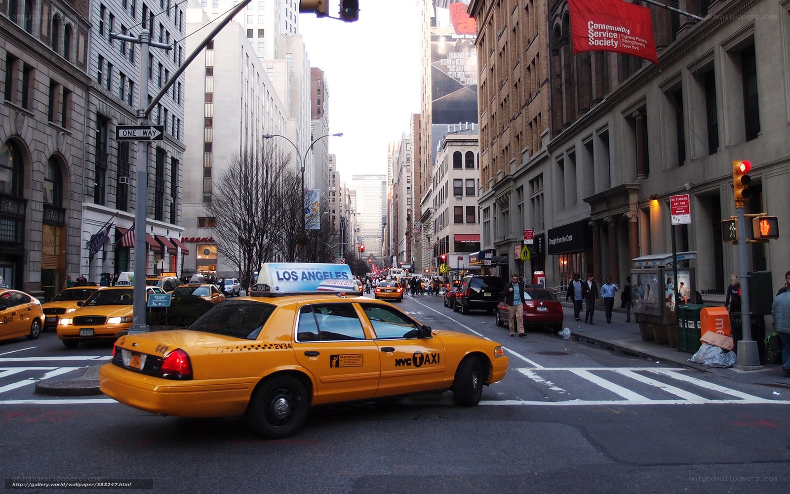 Yellow taxi on a city street