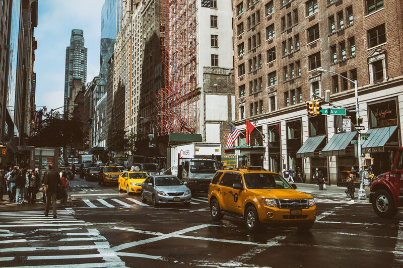 Yellow Taxi on City Street — Busy