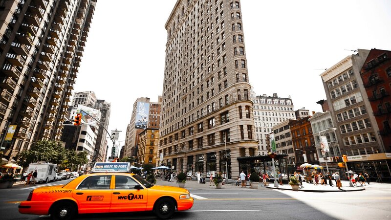 Yellow Taxi on Street — Busy