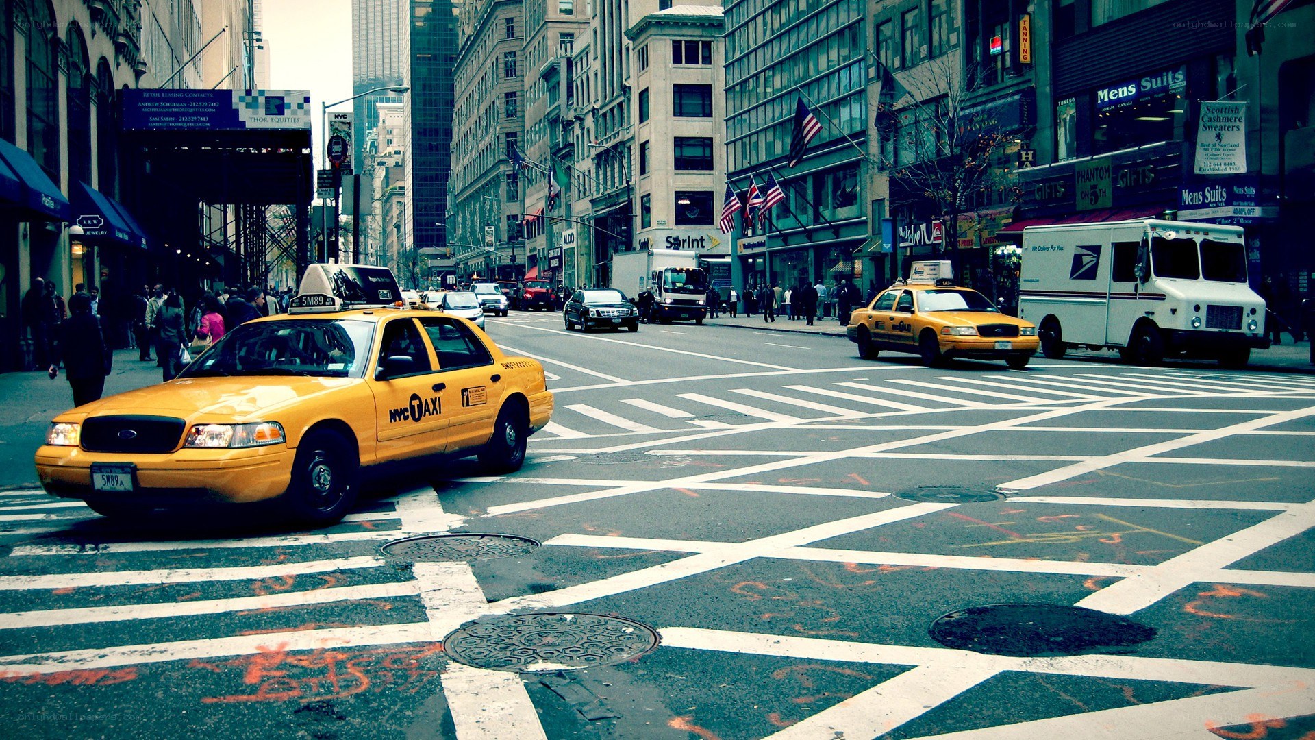 Yellow taxis at a city intersection