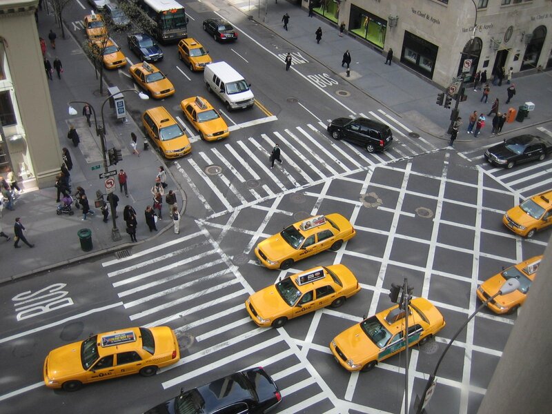 Yellow Taxis at Intersection — Busy, Afternoon, Photograph, Pedestrians, Buildings, Crosswalks