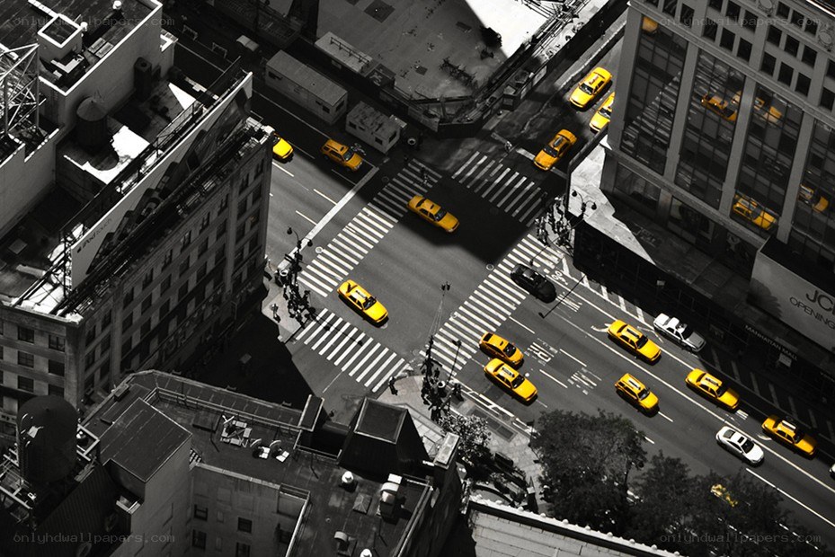 Yellow taxis in city intersection