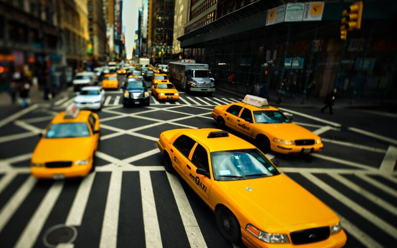 Yellow taxis in city traffic