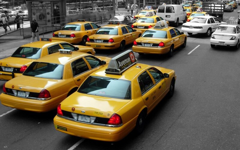Yellow taxis in city traffic
