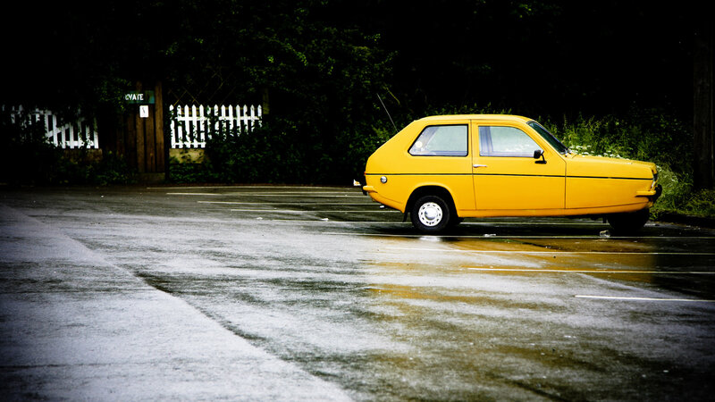 Yellow Three-wheeled Car