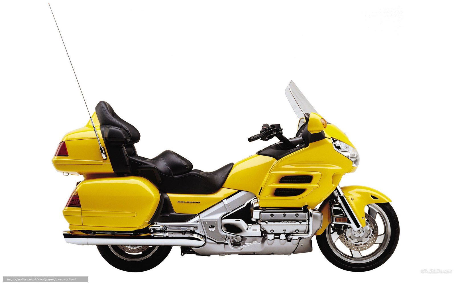 yellow touring motorcycle