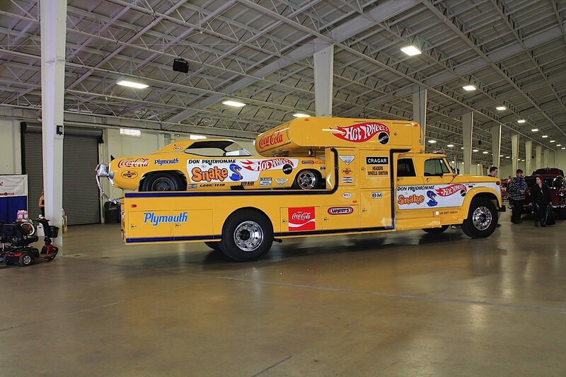 Yellow Tow Truck with Car