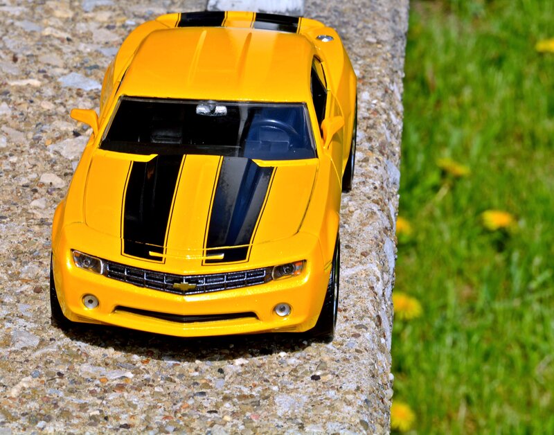 Yellow Toy Car — Bright, Sunny