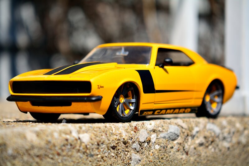 Yellow Toy Car — Dramatic, Afternoon, Photograph