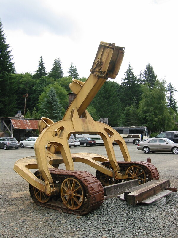 yellow tracked excavator sculpture
