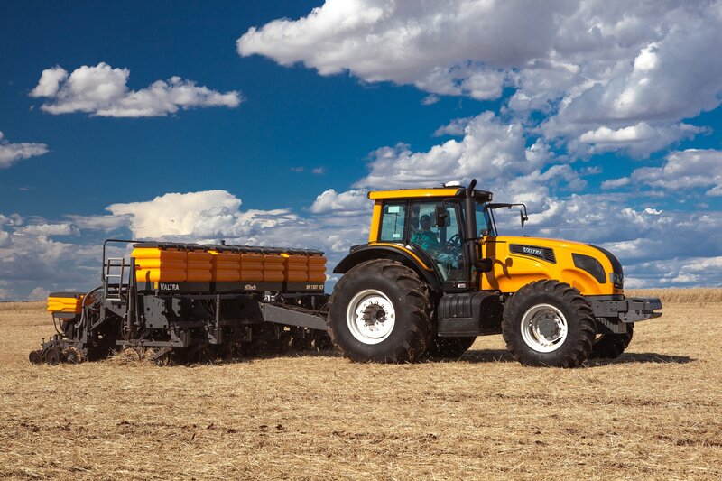 Yellow Tractor in Field — Dramatic