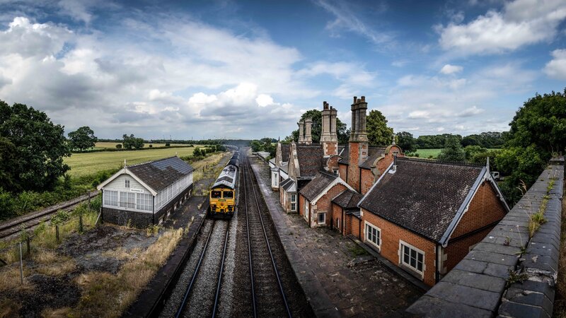 Yellow Train at Station — Blue