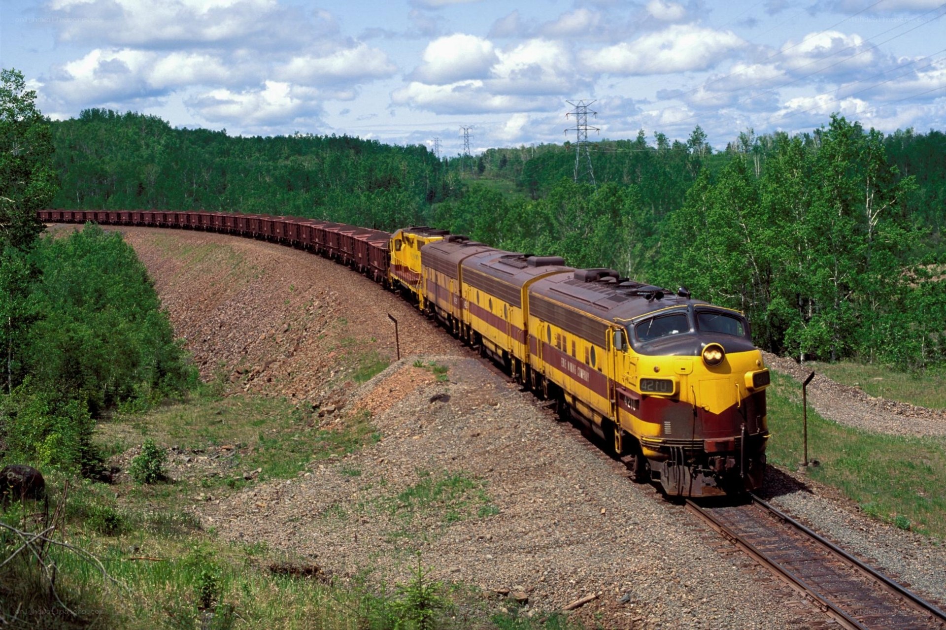 Yellow train on a curved track