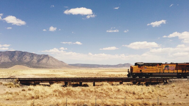 Yellow Train on Tracks — Blue