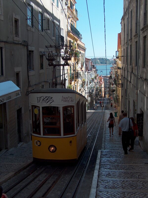 Yellow tram on a steep street