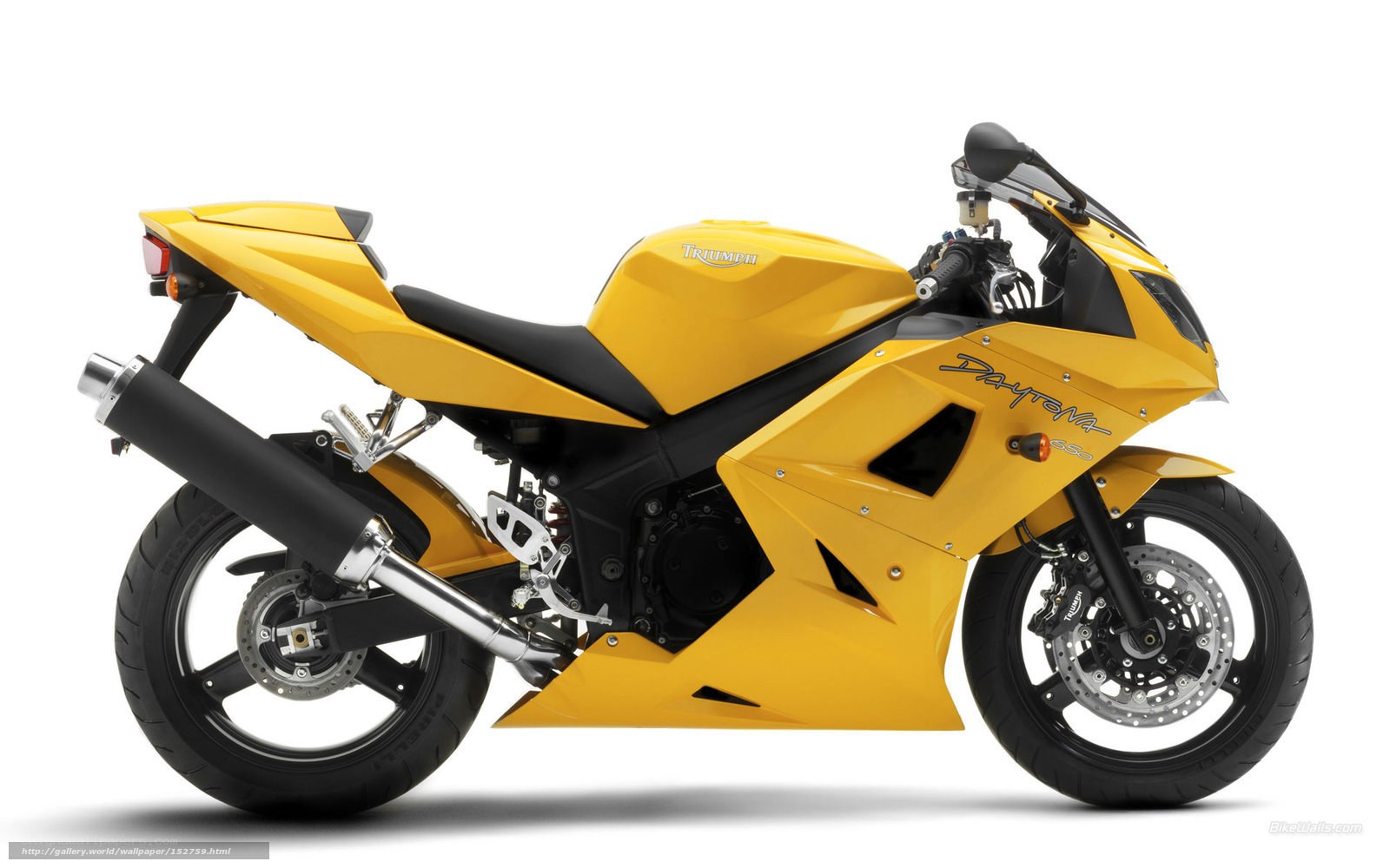 yellow triumph daytona 650 motorcycle