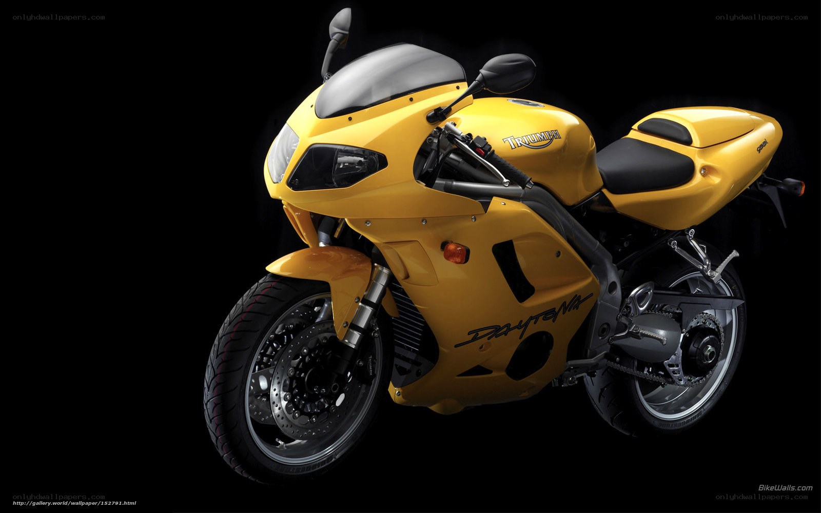 yellow triumph daytona motorcycle
