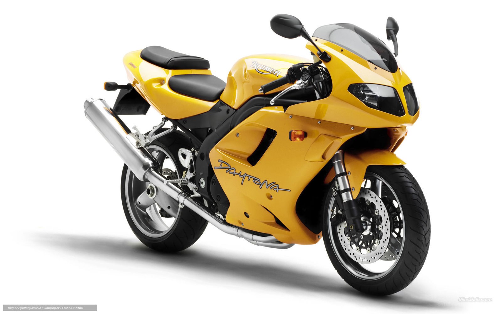 yellow triumph daytona motorcycle