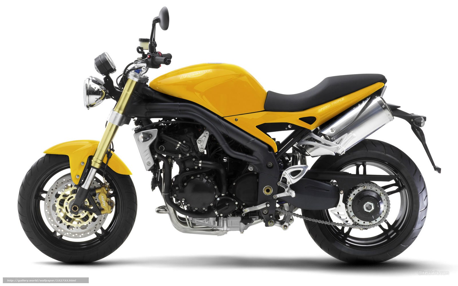 yellow triumph motorcycle