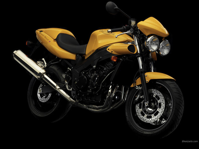 yellow triumph motorcycle