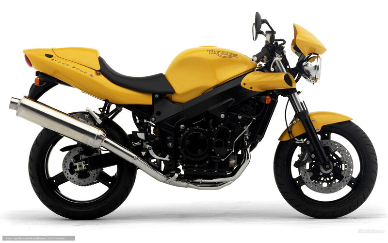 Yellow Triumph Motorcycle — Neutral, Photograph