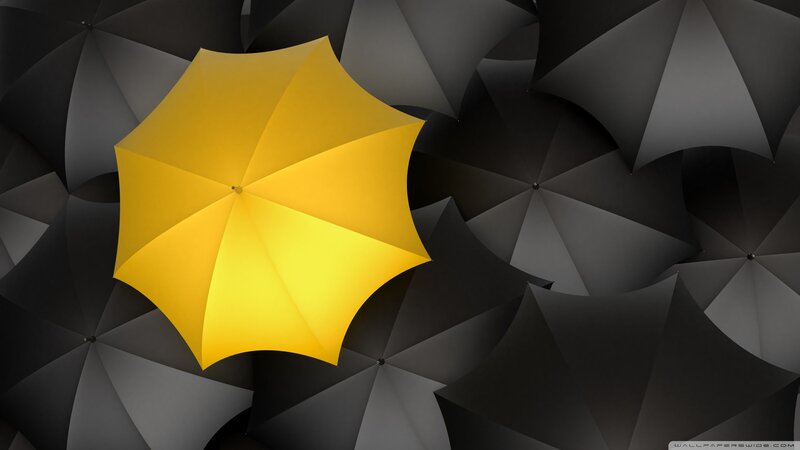 Yellow Umbrella Among Black Ones — Dramatic