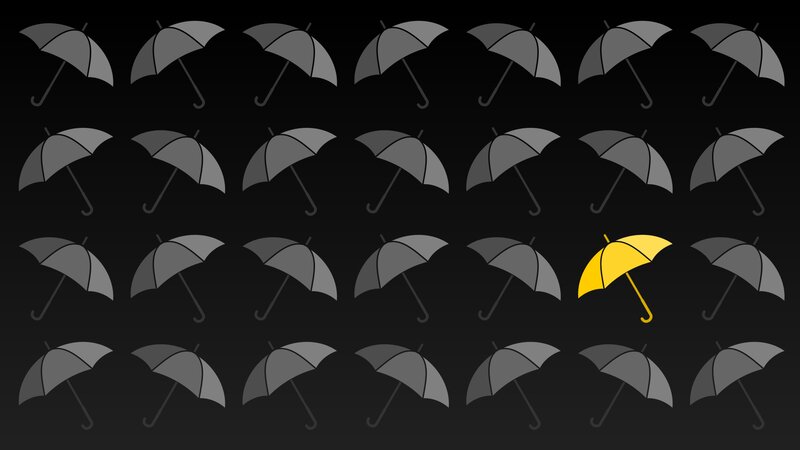 Yellow Umbrella Among Gray Ones