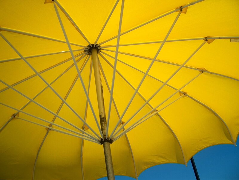 yellow umbrella from below