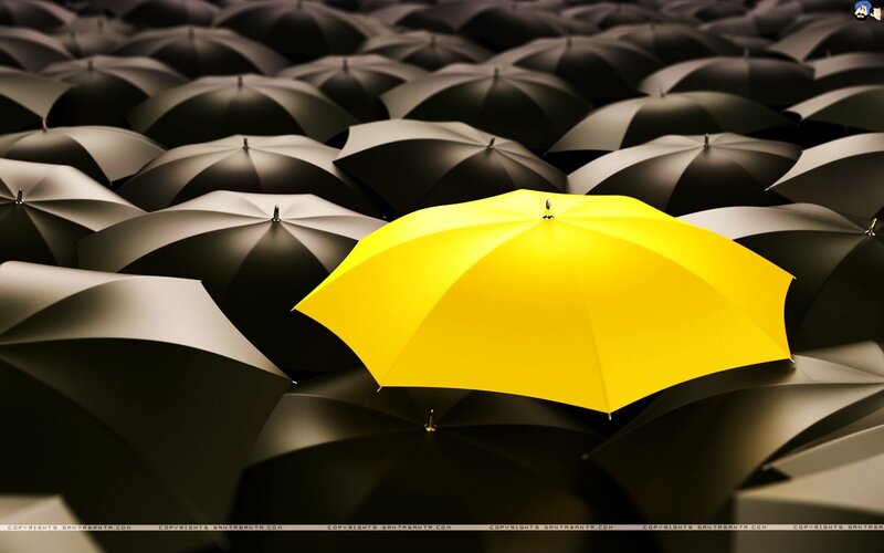 yellow umbrella in crowd