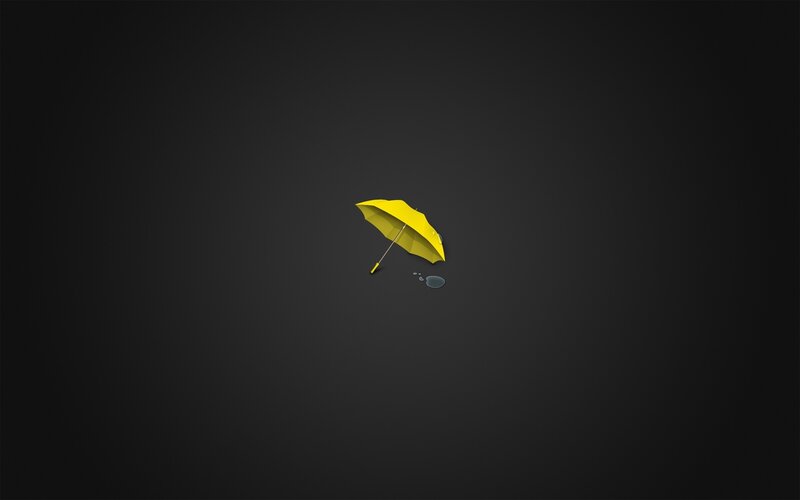 Yellow Umbrella on Dark Surface