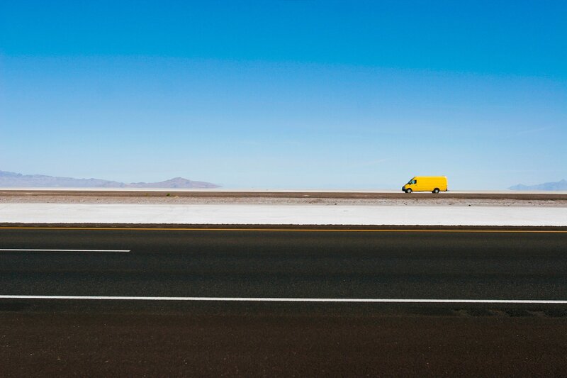 Yellow Van on Desert Road