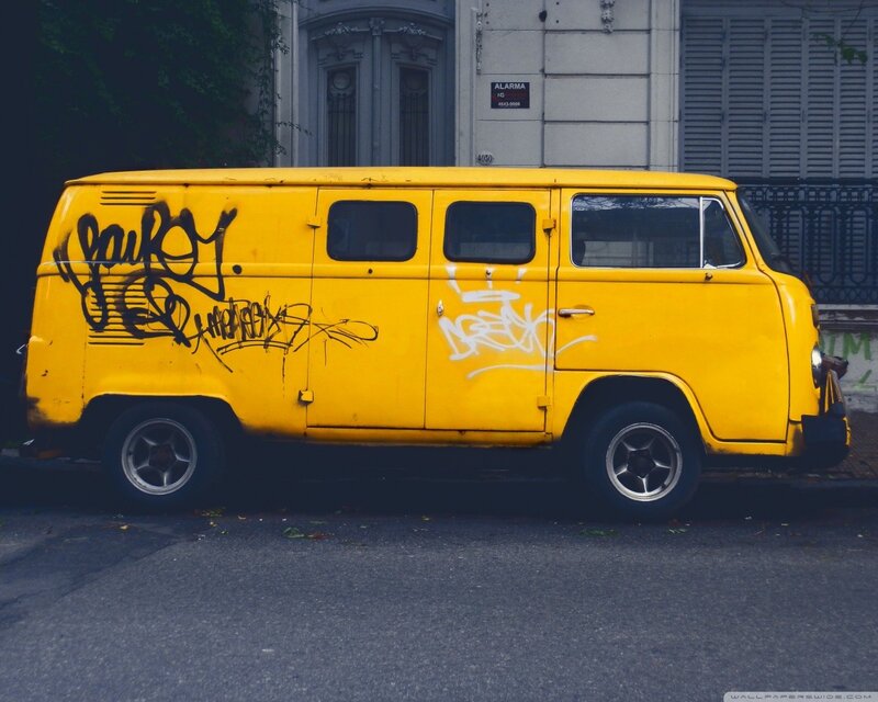 Yellow van with graffiti