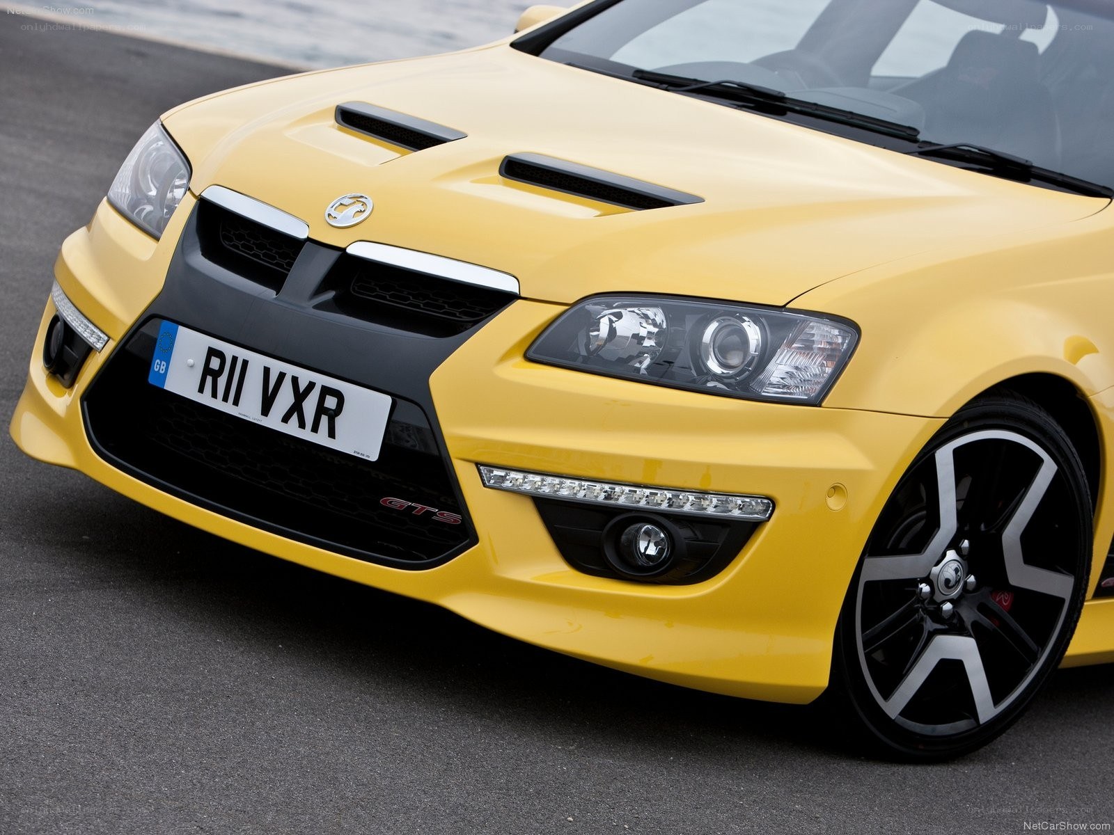 yellow Vauxhall GTS front view