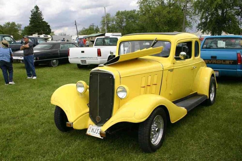 Yellow vintage car at a show
